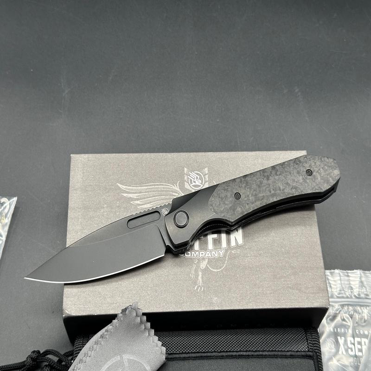 Griffin Company X Series Bolster Lock Blackwashed CPM Magnacut Blade Blackwashed Ti Bolster Lock with Marbled Carbon Fiber